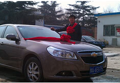 超前涂料獎勵員工轎車，真石漆生產(chǎn)廠家！